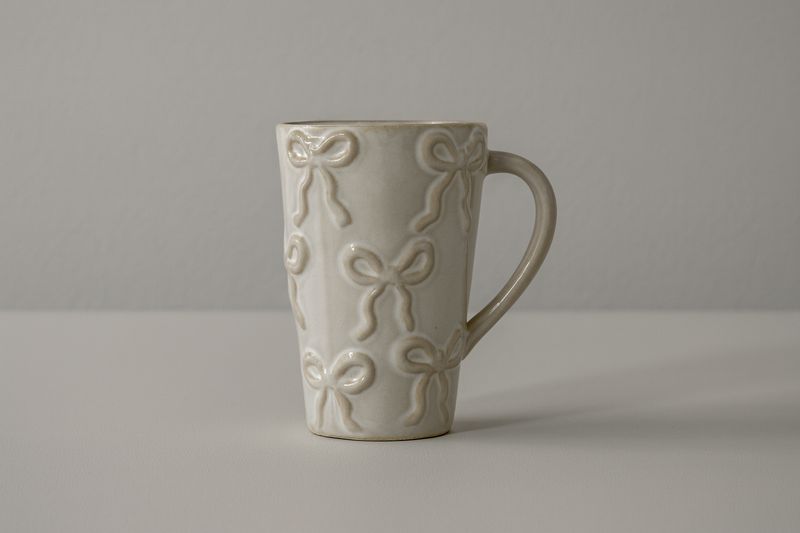 Bow Textured Stoneware Tall Mug – White