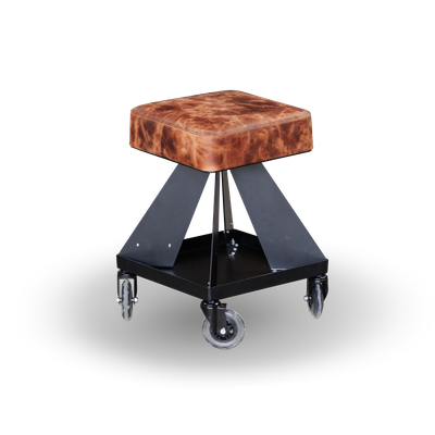 Angled view of the Fast Freddy HiBoy shop chair in Canada, featuring 100% water buffalo leather or genuine black leather, with a solid square base and adjustable backrest