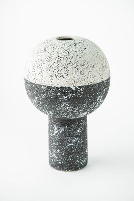 Black and white vase pedestal