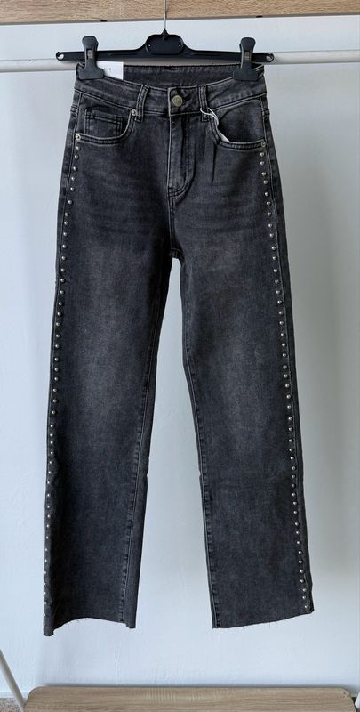 Vaquero tachas gris lavado