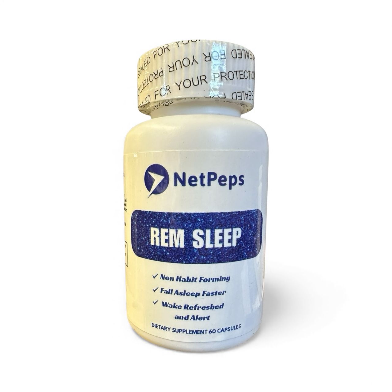 NetPeps REM Sleep supplement bottle, white with blue label, 60 capsules, non-habit forming, supports deep sleep, magnesium.