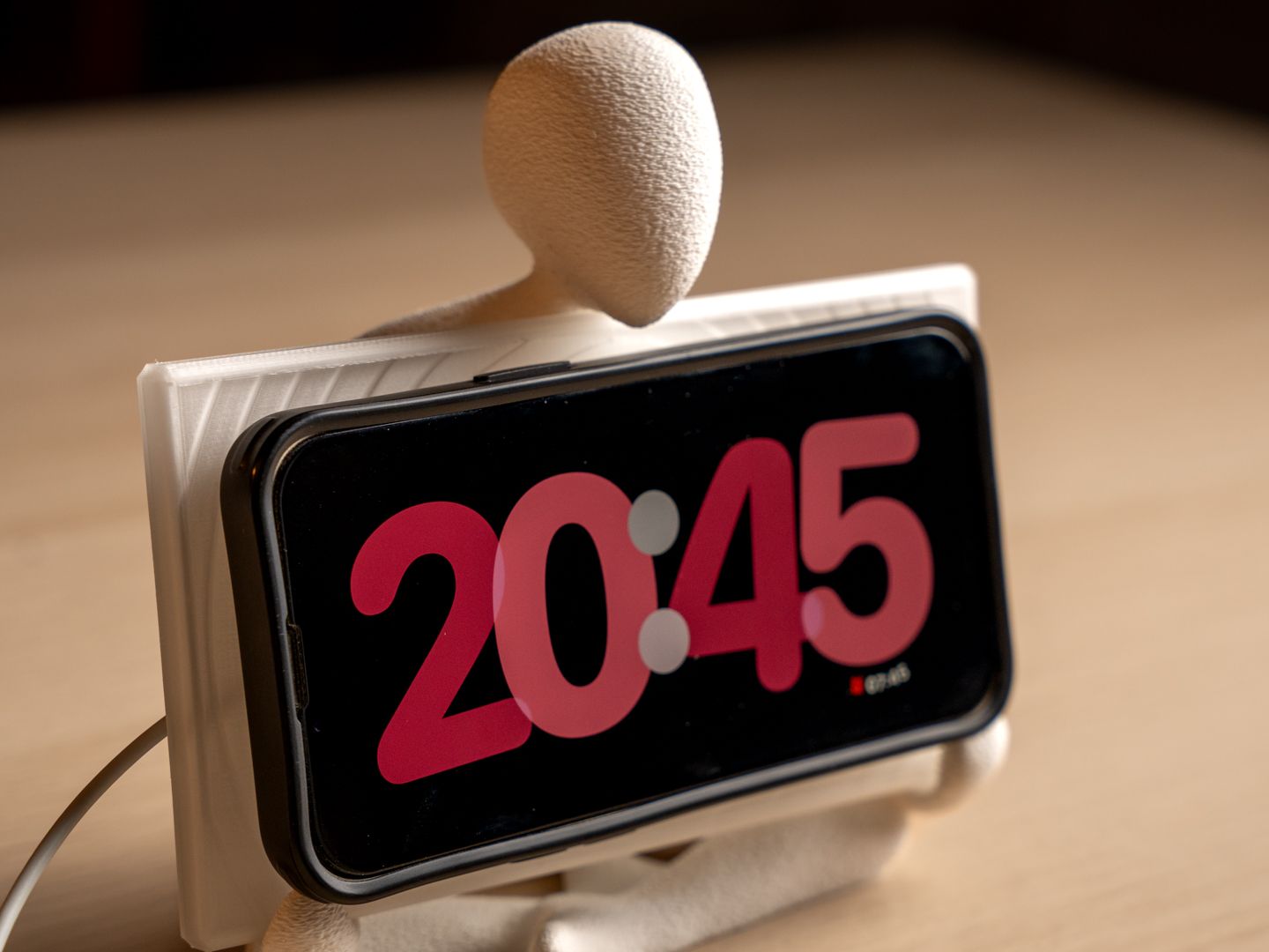 Siting smartphone holder figure