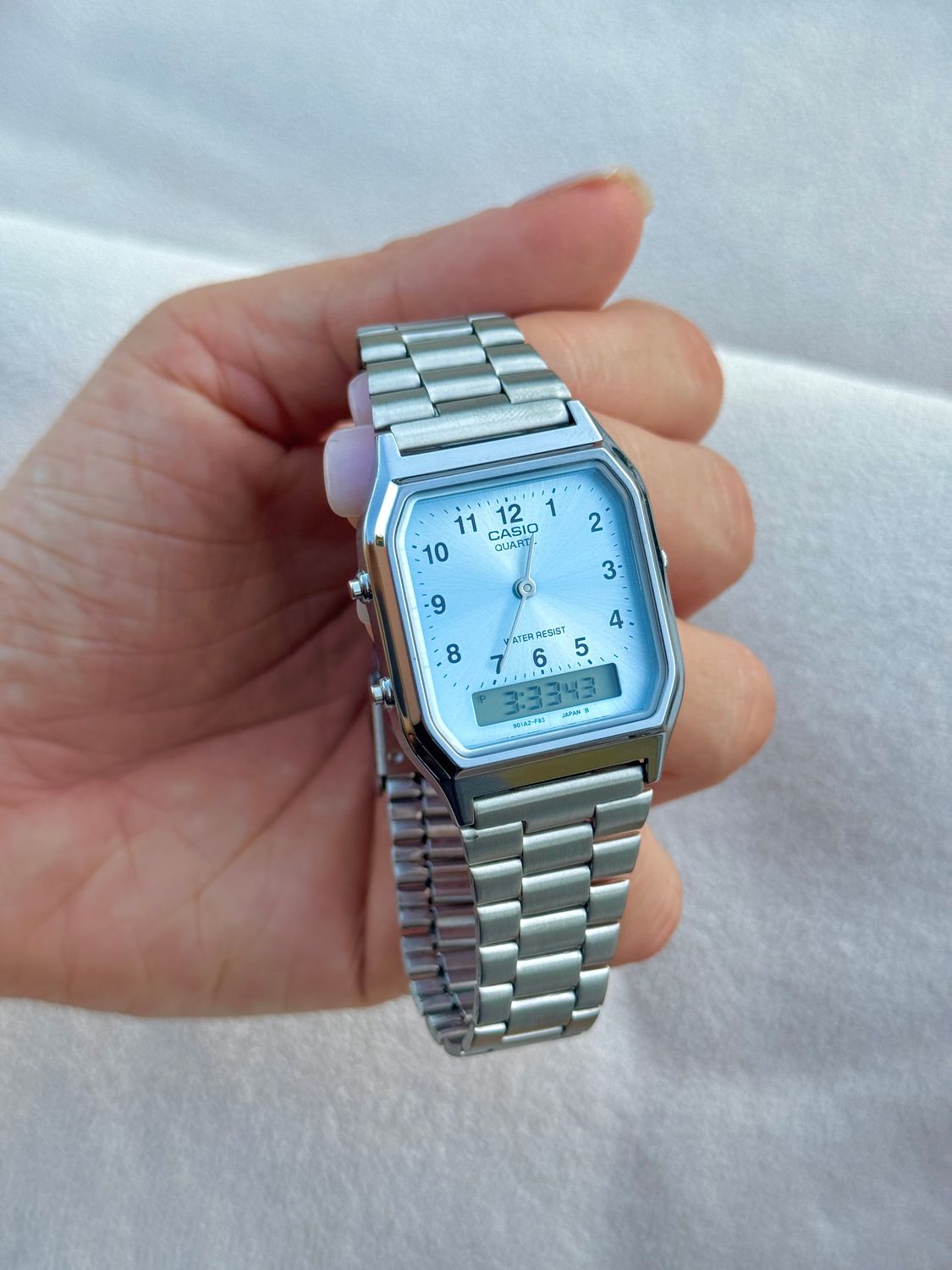 Casio old money plata fondo celeste