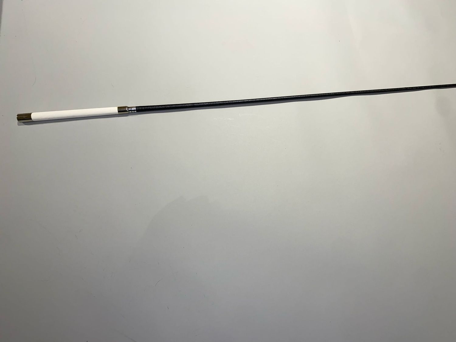 Fleck marathonwhip with white handle