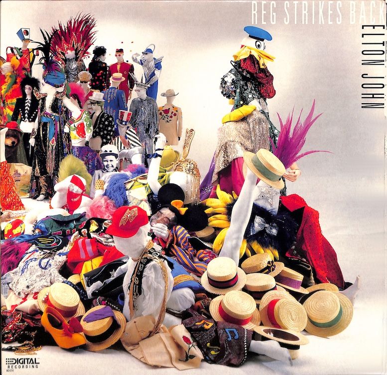 Elton John ‎– Reg Strikes Back