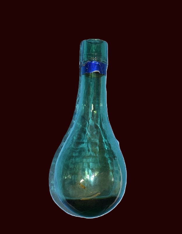 Antique handblown, round bottom wine bottle, early 20th century.