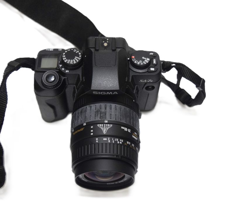 Sigma SA-7M SLR Film Camera And Lenses