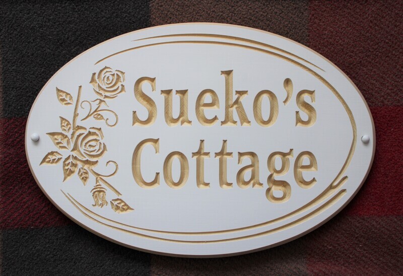 Custom Exterior Oval Wood Sign with Flowers