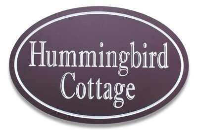 Elegant Custom Exterior Oval Cottage Sign Painted with Precision Carved White Text in Shadow font