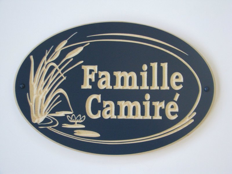 Custom Exterior Wood Oval Cottage Sign with Carved Cattails and Lily Pads