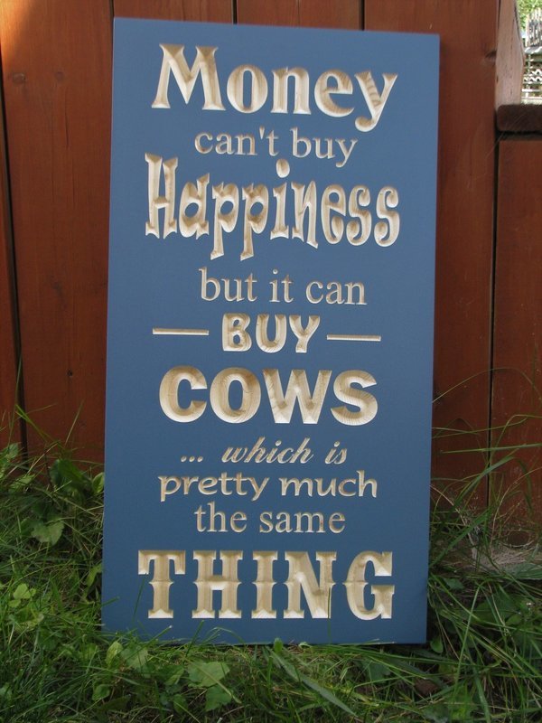 Money Can't buy Cows but it Can Buy Happiness Sign