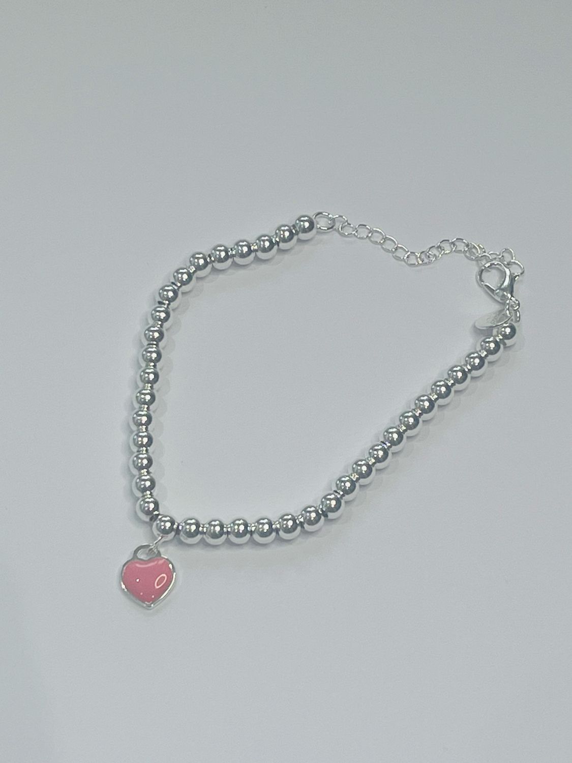 Sterling Silver Round Ball Bracelet With Pink Heart Charm