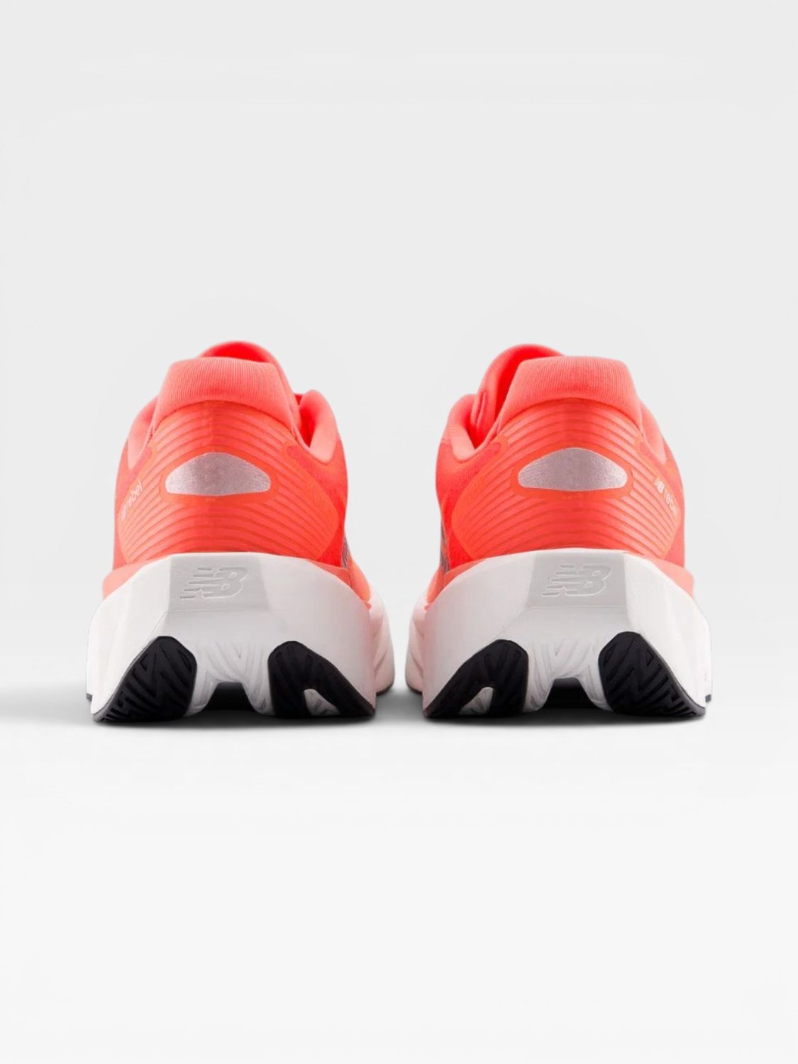 New Balance Women FuelCell Rebel v5 (Urgent Red)