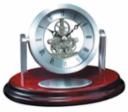 SILVER CLOCK ON OVAL BAS
