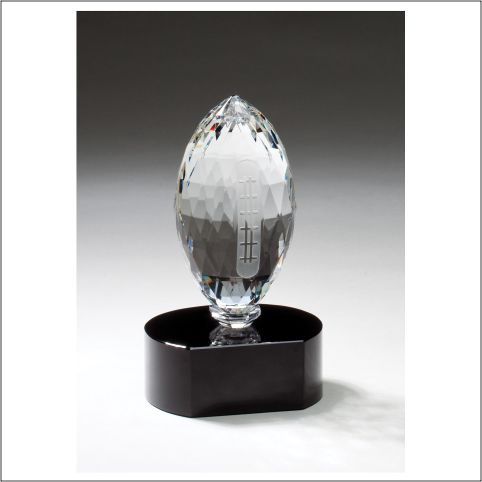 FOOTBALL UPRIGHT ON BLAC