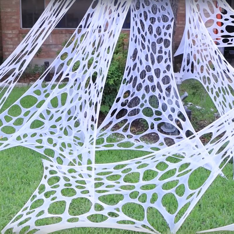 Spinnennetz 200 x 200 cm mit 13 Spinnen Spinnennetz 200 x 200 cm mit 13 Spinnen