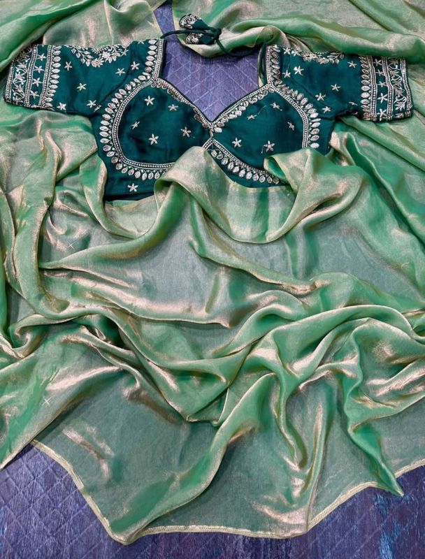 Stiched blouse with saree with Golden shine