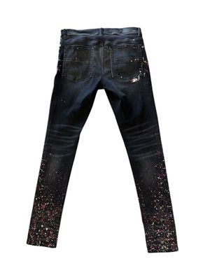 AMIRI PAINT SPLATTERED JEANS
