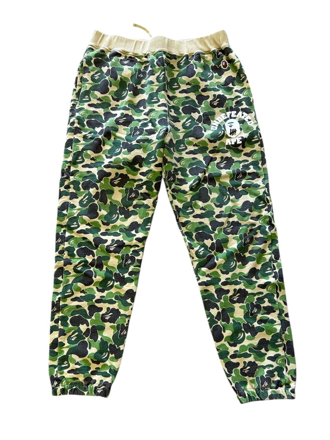 BAPE X UNDEFEATED ABC CAMO SWEATPANTS “GREEN”