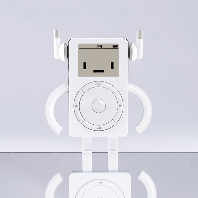 Front view of the iBoy figure. It looks like the iconic MP3 player with a big wheel on its body. The earbuds become his ears