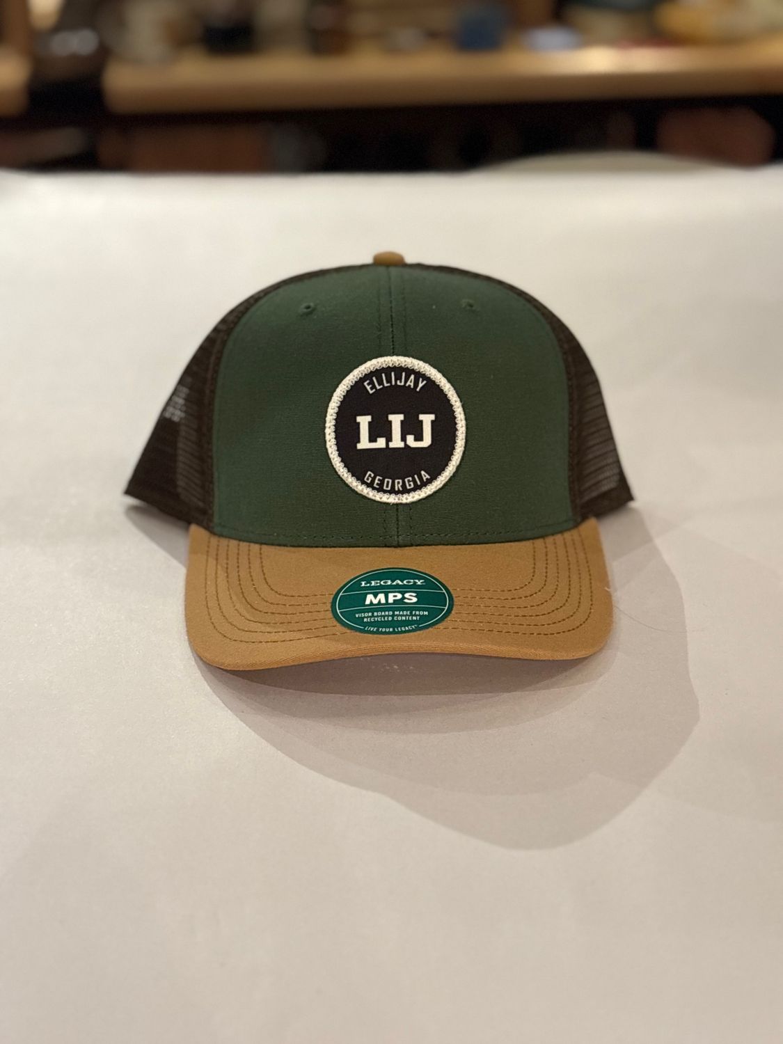 Green/Carmel/Brown Trucker Hat w/CHUCKY Mid-Pro Snapback LIJ Logo