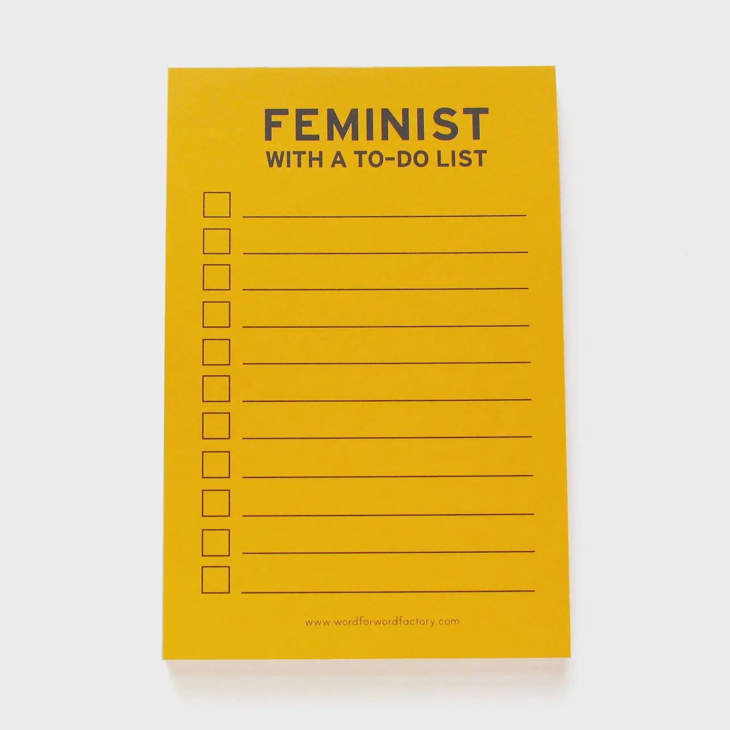 Feminist with a To-Do List notepad