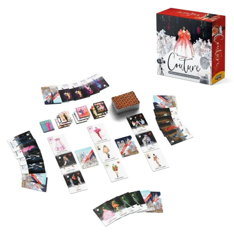 Couture board game components, including box, cards, and tokens, laid out on a white background, showcasing fashion auction game pieces.