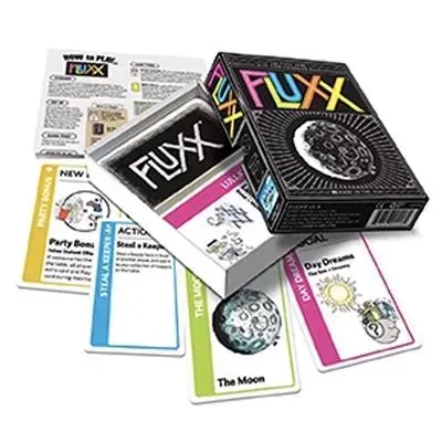 Fluxx 5.0 card game box and cards, featuring colorful illustrations, with box top and cards displaying rules and moon and sun graphics.