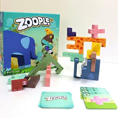 Mandoo Games Zoople dexterity game with colorful wooden animal blocks and cards, blue box and logo, for 2-4 players aged 8+.