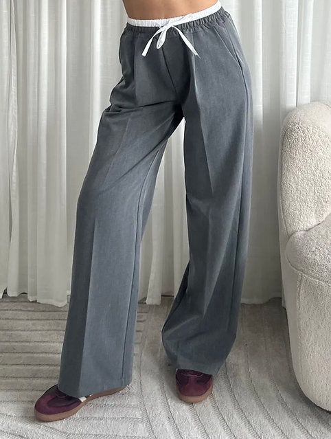 Pantalon grijs met witte band