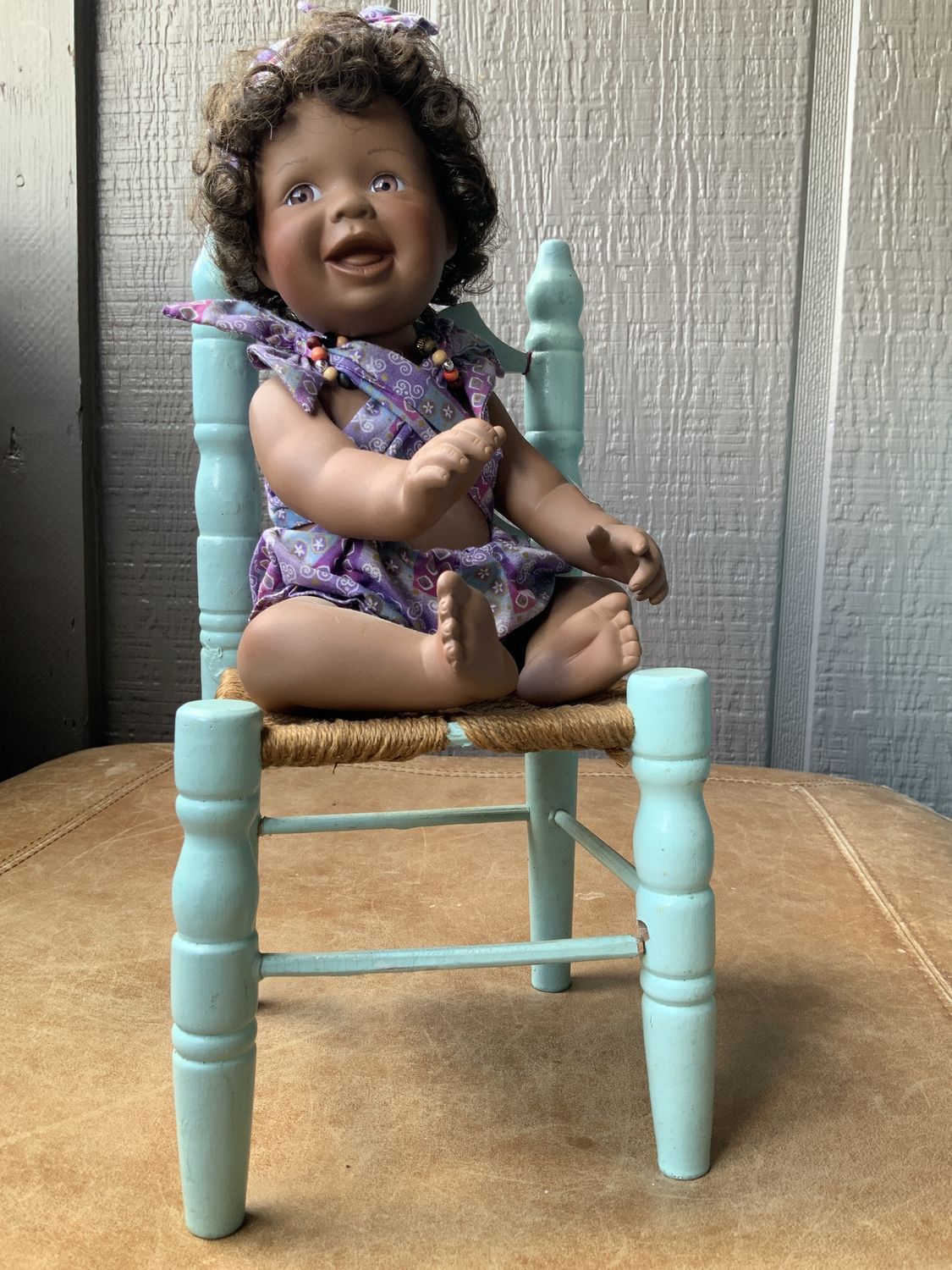 Baby with Blue Chair