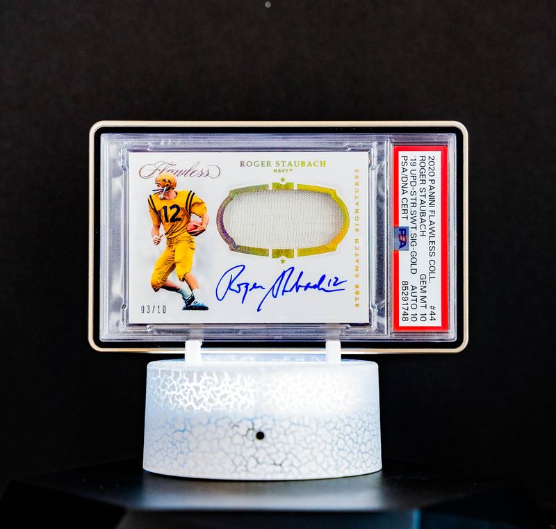 2020 Panini Flawless Collection 19 UPD-STR. Swatches Signature Gold Roger Staubach (SN: 3/10) – PSA GEM MT 10, Auto 10 (PSA Cert #85291748)