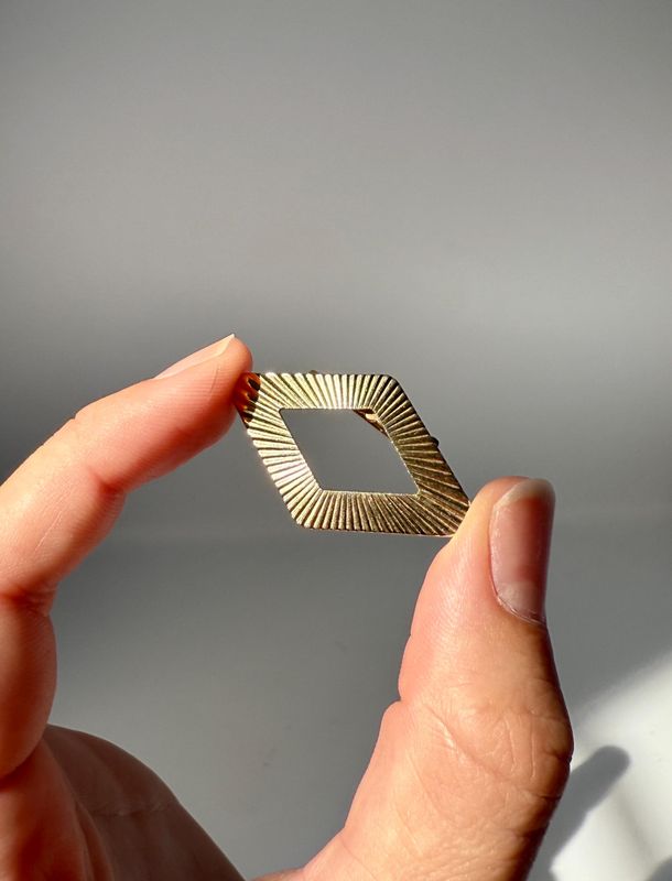 The Enid: Gold-Toned Rhombus Starburst Brooch