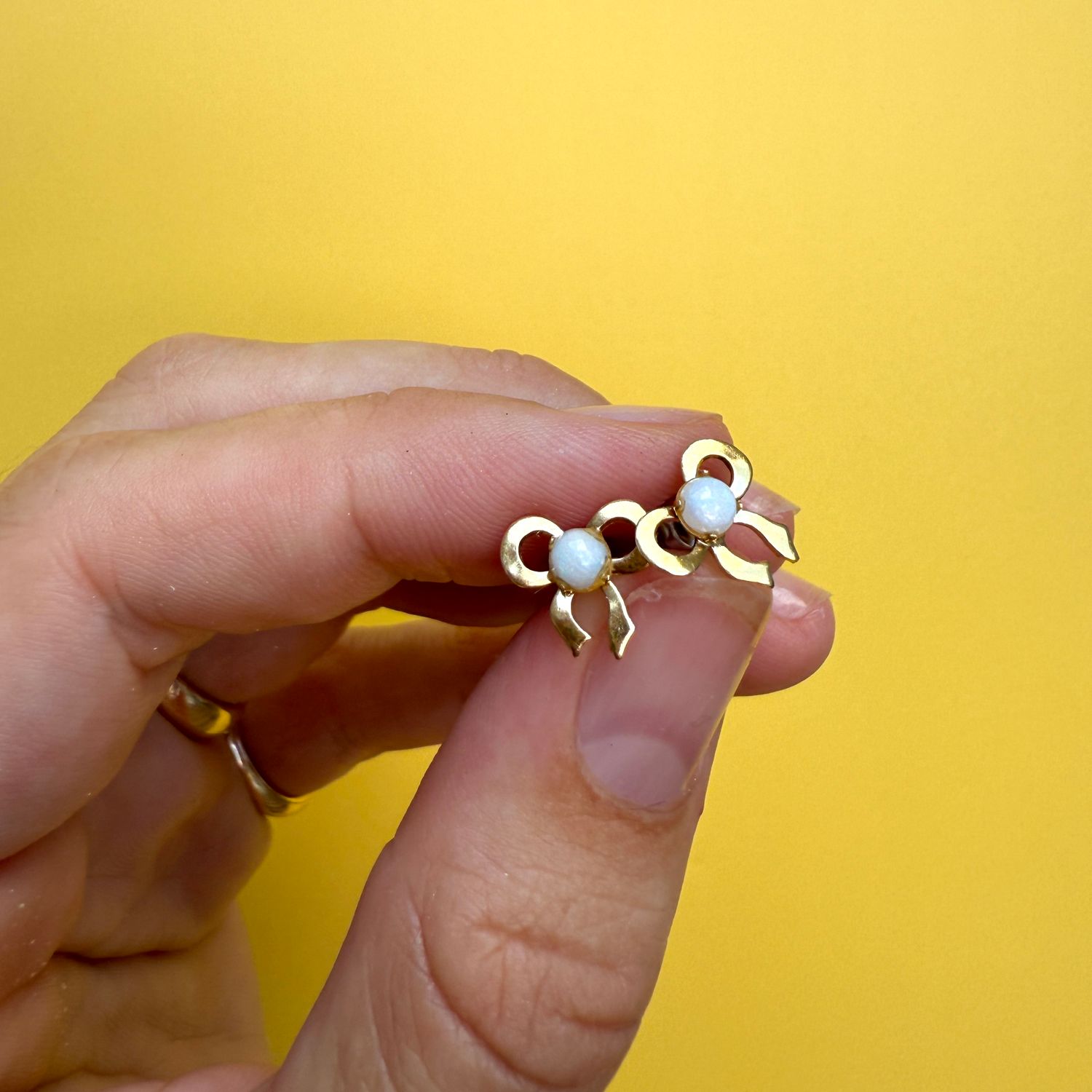 The Jack: 14K Yellow Gold Bow and Opal Stud Earrings