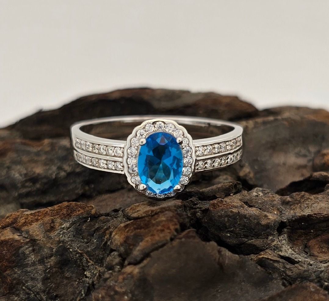 Sky Blue CZ Halo Ring – Sterling Silver Dreamy Blue Gemstone with Double Diamond Shoulders