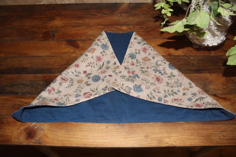 Handmade reversible floral table runner with navy blue backing