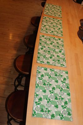Handmade green shamrock table placemats perfect for St. Patrick’s Day kitchen and dining decor.