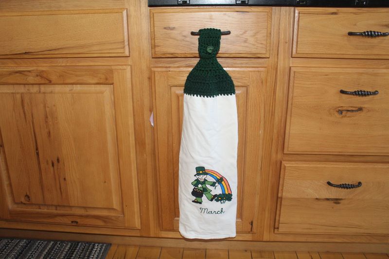 Hand-painted St. Patrick’s Day kitchen hand towel with festive Irish design.