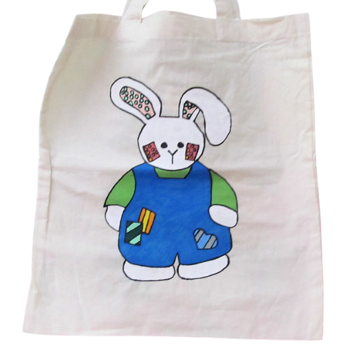 Hand painted Easter bunny tote bag with painted rabbit and decorative Easter eggs on reusable cotton bag.