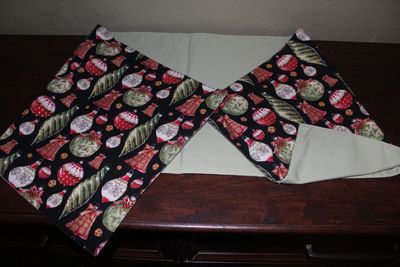 Holiday Ornament Print with Pastel Green Backing | Festive Dining & Home Decor– Handmade Reversible Christmas Table Runner Holiday table runner featuring festive ornaments and solid pastel green fabric reverse side
