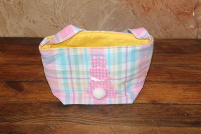 Handmade pastel plaid Easter basket tote with pink bunny applique and pom pom tail for kids Easter egg hunts.
