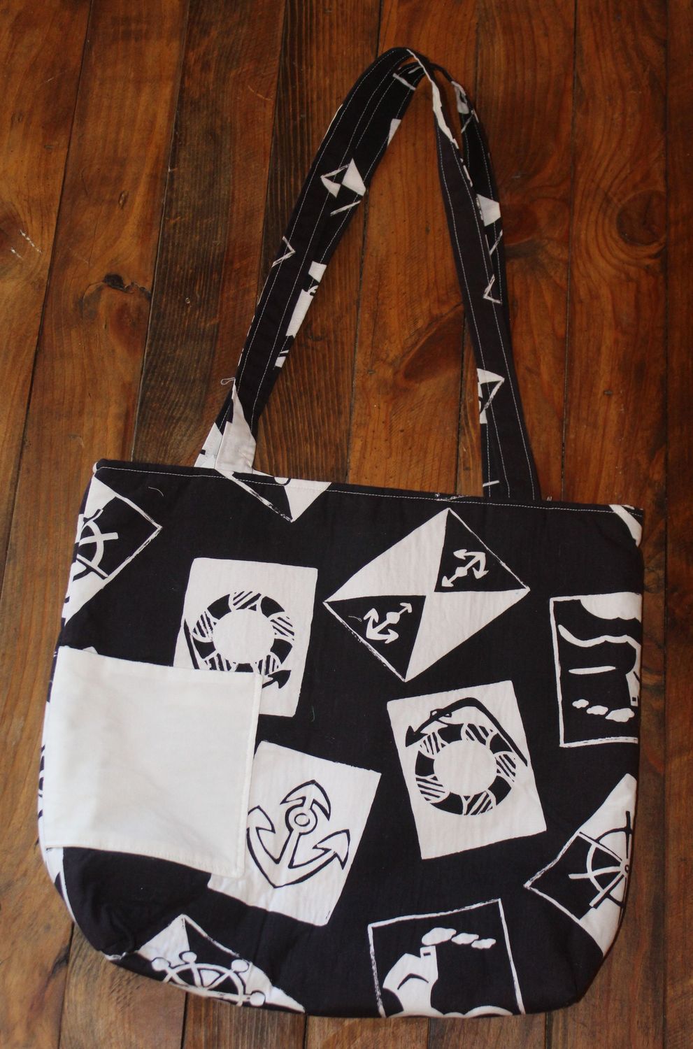 Handmade black and white nautical anchor tote bag with front pocket.