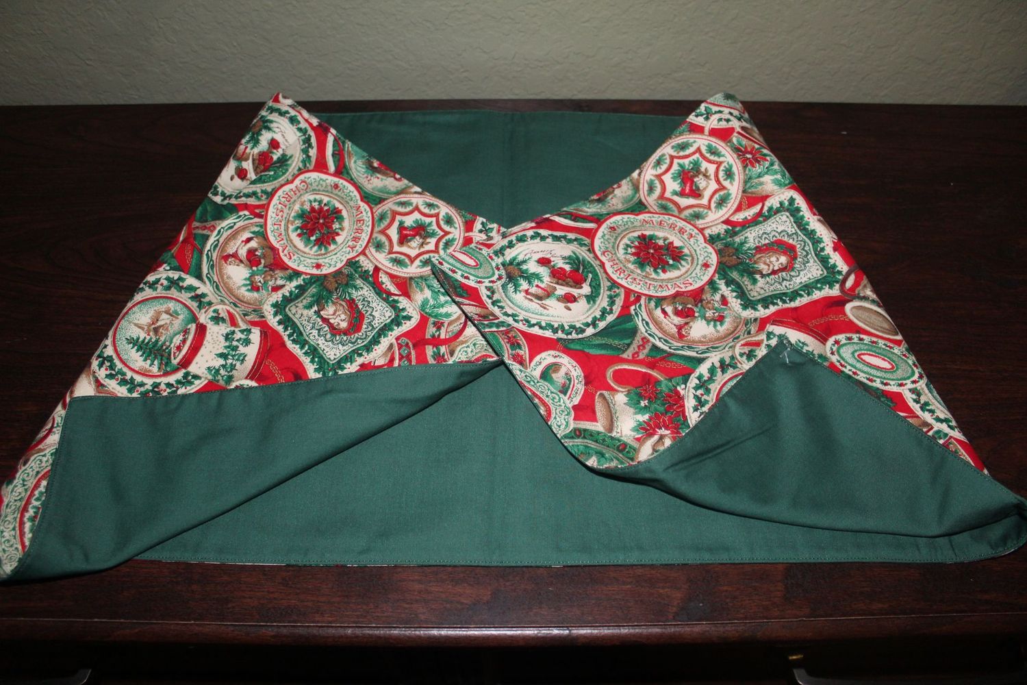 Handmade Reversible Solid Green Christmas Table Runner | Festive Holiday Dining Decor Handmade reversible Christmas table runner with red and green poinsettia and Santa holiday pattern