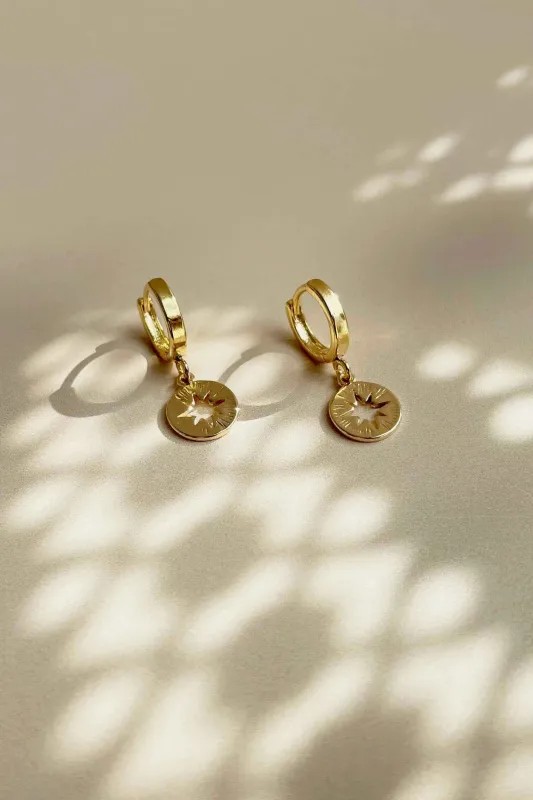 Star Huggie earrings