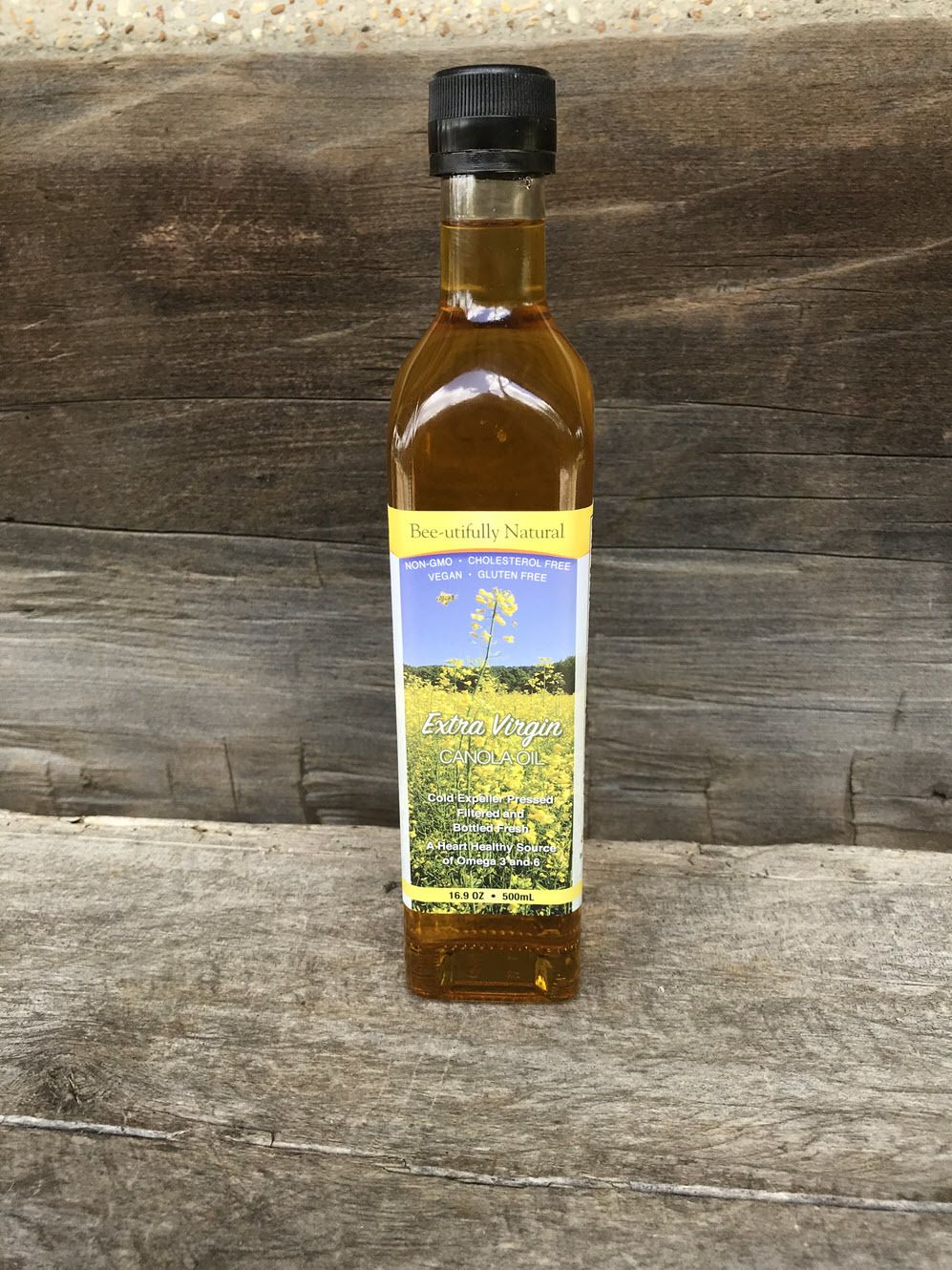 Extra virgin non-GMO canola oil cold pressed at Duck It Farm in Hickman County TN, bottle front