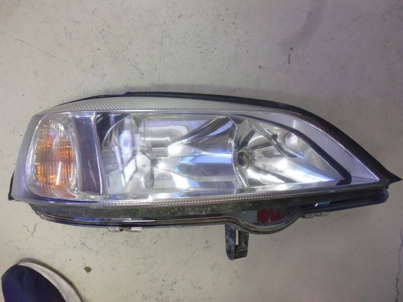 Faro fanale anteriore destro Opel Astra G usato originale.