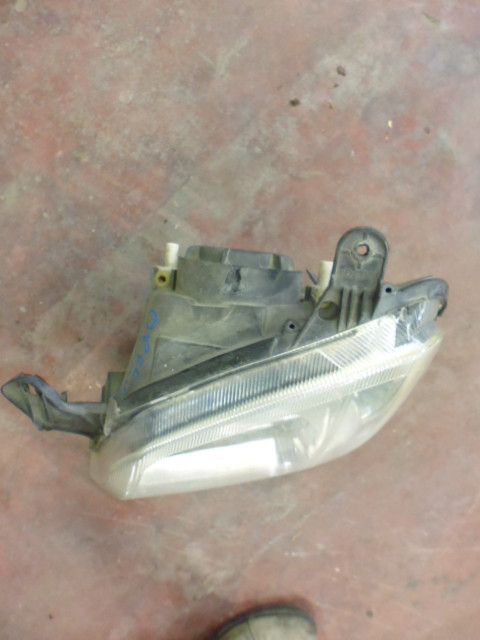 Faro fanale anteriore sinistro lato guida Opel Meriva prima serie.