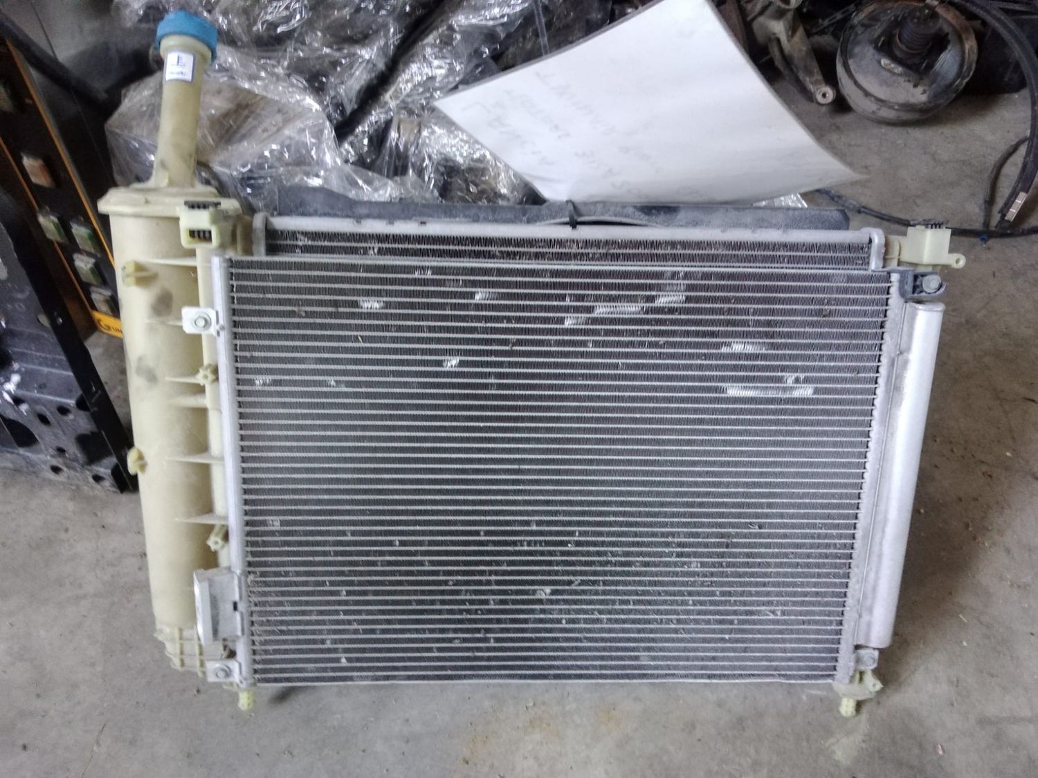 Lancia Ypsilon Twinair radiatore, condensatore, ventola raffreddamento e vaschetta liquido.