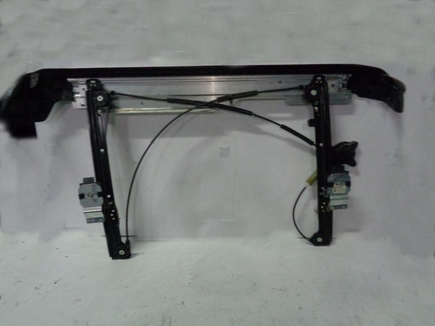 Meccanismo alzavetro alzacristallo sinistro Mini Cooper del 2008.