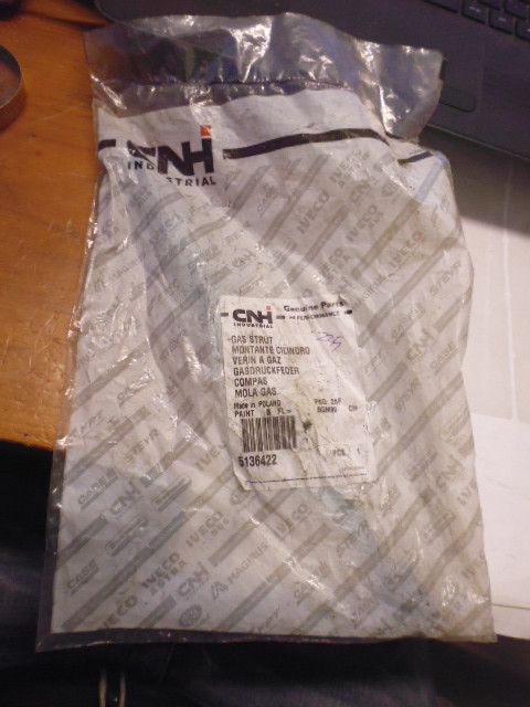 Ammortizzatore molla a gas originale CNH 5136422 per trattori Fiat e New Holland.